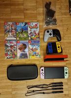 Nintendo OLED Mario Red édition + 6 jeux + manettes