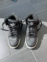 Puma Kinder Turnschuhe Gr. 37 gefüttert schwarz guter Zustan