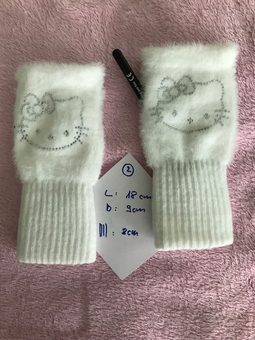 Guanti: Hello Kitty Fingerlose Handschuhe weiss neu – Nuovo e nell'imballaggio originale da Niederteufen venduto da mix18