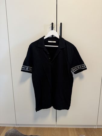 Givenchy Polo Shirt schwarz mit Logo Ärmel gebrauchter Zusta