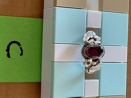 Ring mit Granat / Gr. 54