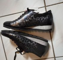 Stiefelette Brunate in Schlangenprägung