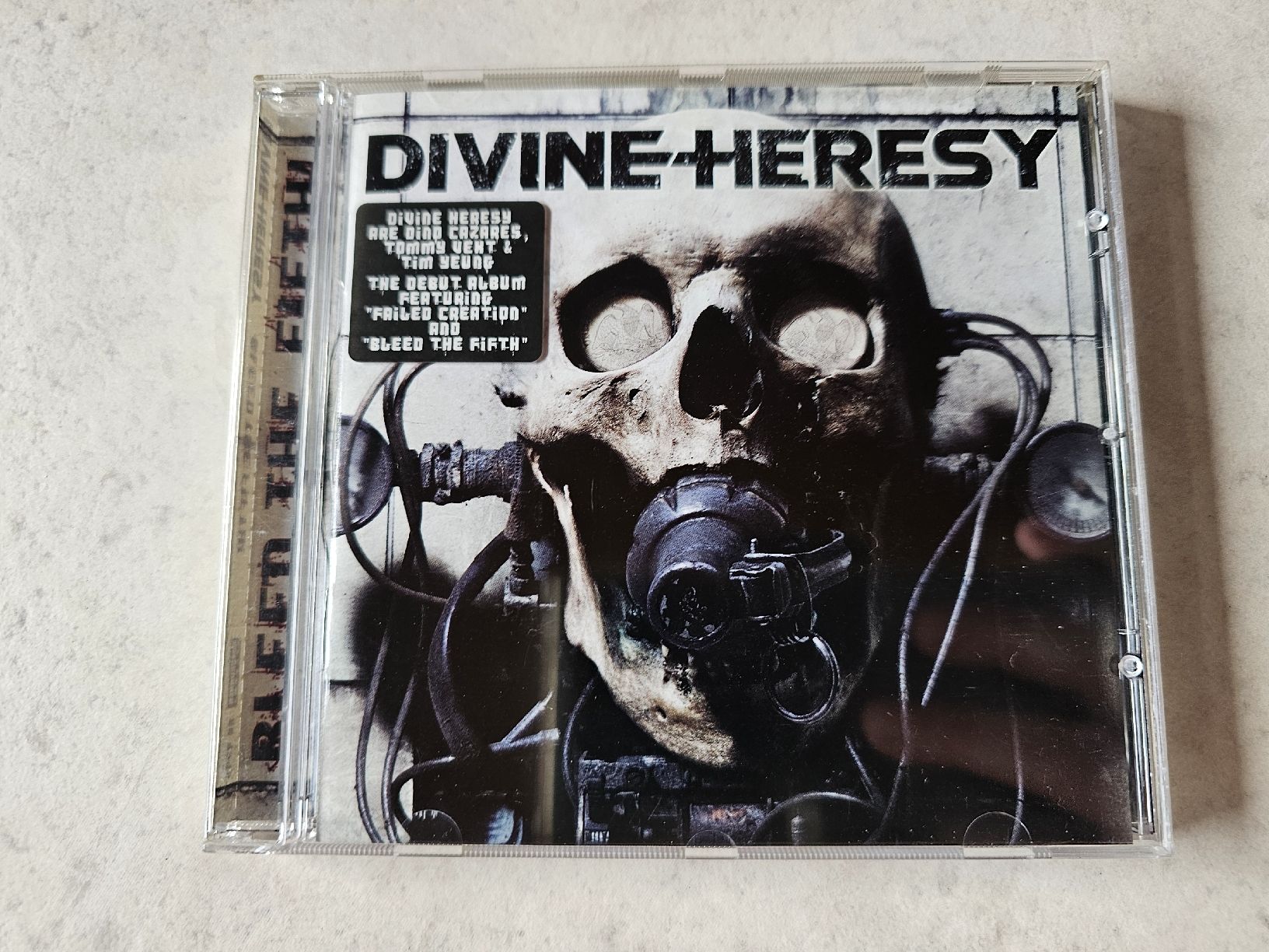 CD: Divine Heresy  -  Bleed The Fifth – Usato da Schneisingen venduto da backstore24