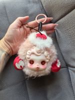 Skullpanda pop mart porta cuffie