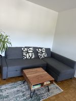 FRIHETEN Eckbettsofa dunkelgrau mit Bettkasten