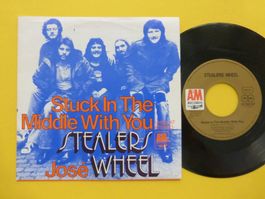 Stealers Wheel – Stuck In The Middle With You / José