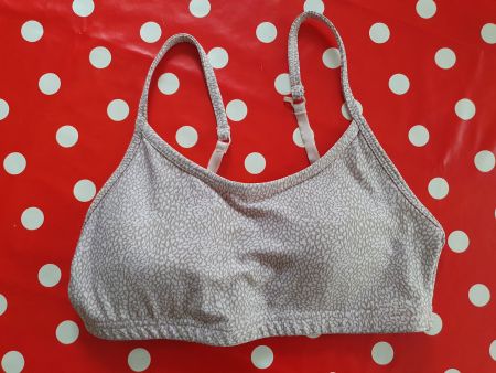 Top sportivo, marca Cotton on Body, taglia S.