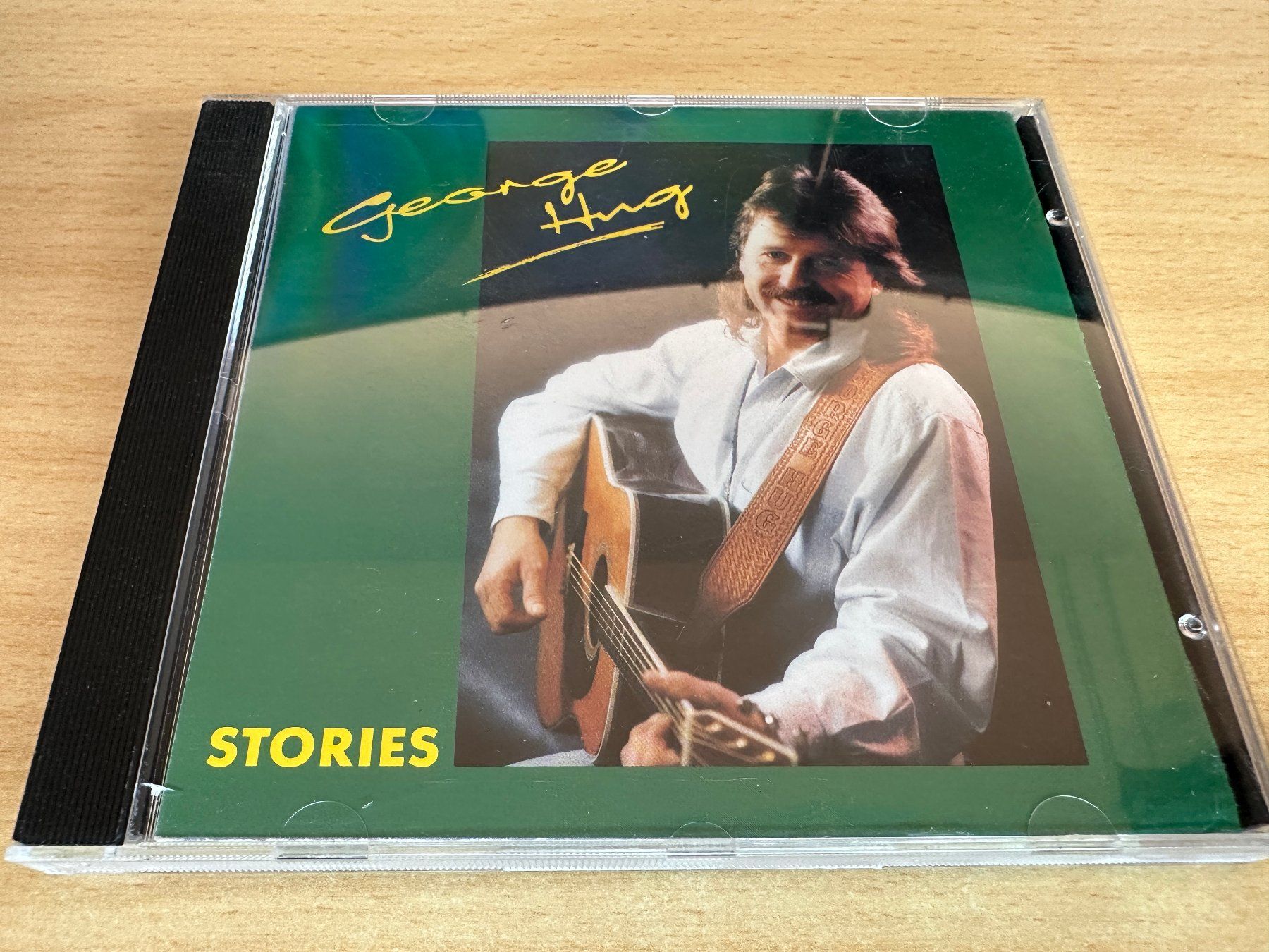 CD: George Hug - Stories – Usato da Rikon im Tösstal venduto da Alpenmutz