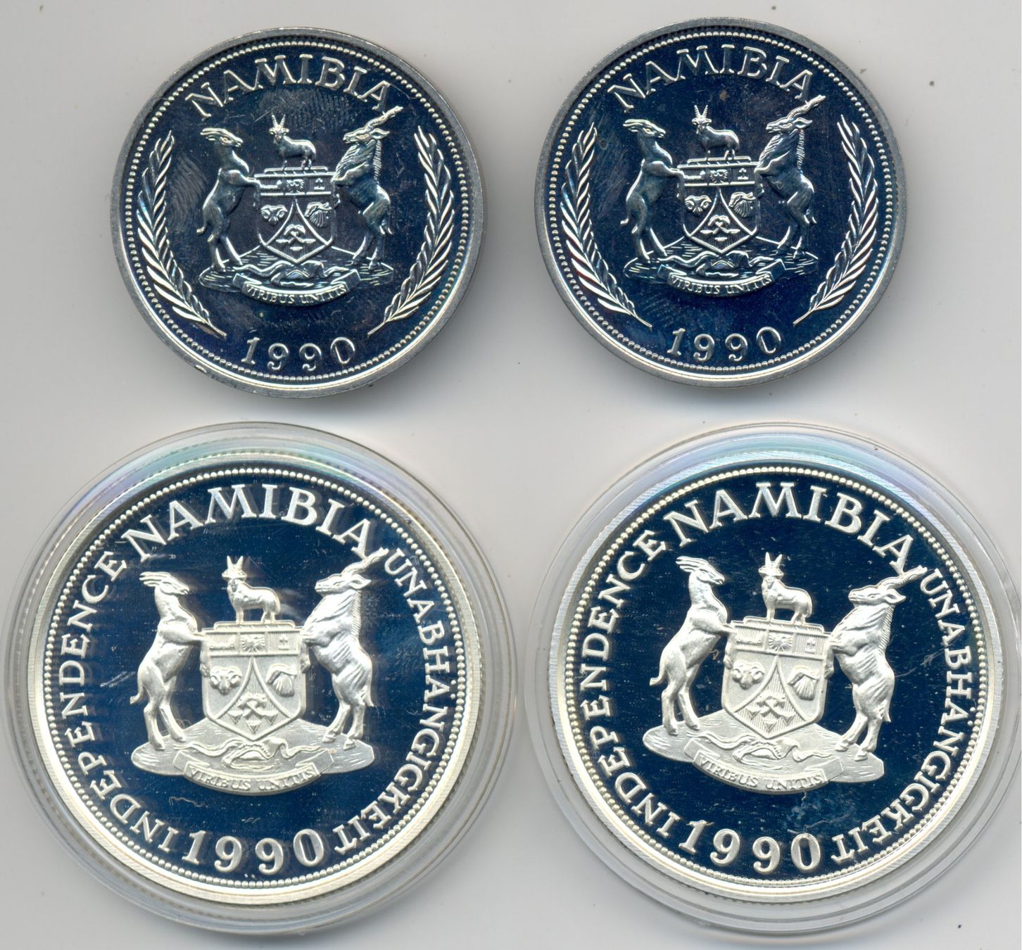 Tutti le monete: Namibia Probemünzen 1+10 Mark, 1+10 Dollars 1990 Silber+CuNi – Nuovo e nell'imballaggio originale da Au SG venduto da Zogu 1