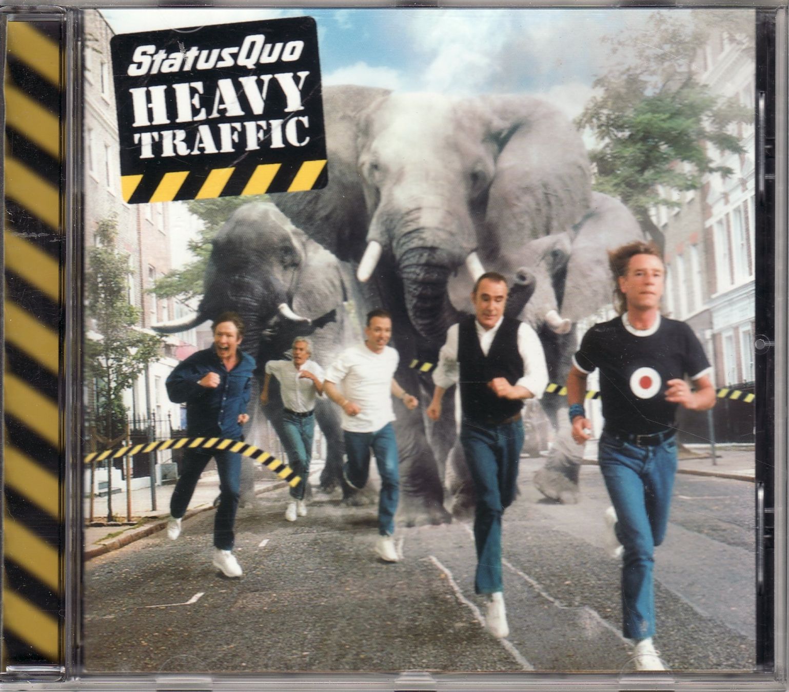 CDs: Status Quo – Heavy Traffic – Neuf (Voir description) à Boussens par catfood01