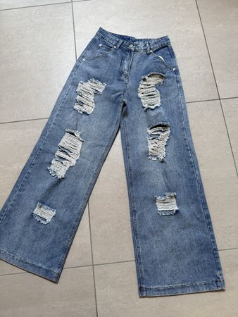 Jeans mit Rissen