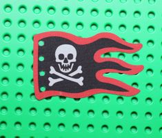LEGO® Cloth Flag 8 x 5 Wave with Red Border and White Skull
