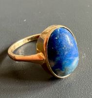 Gold-Ring 9K mit blauem Stein