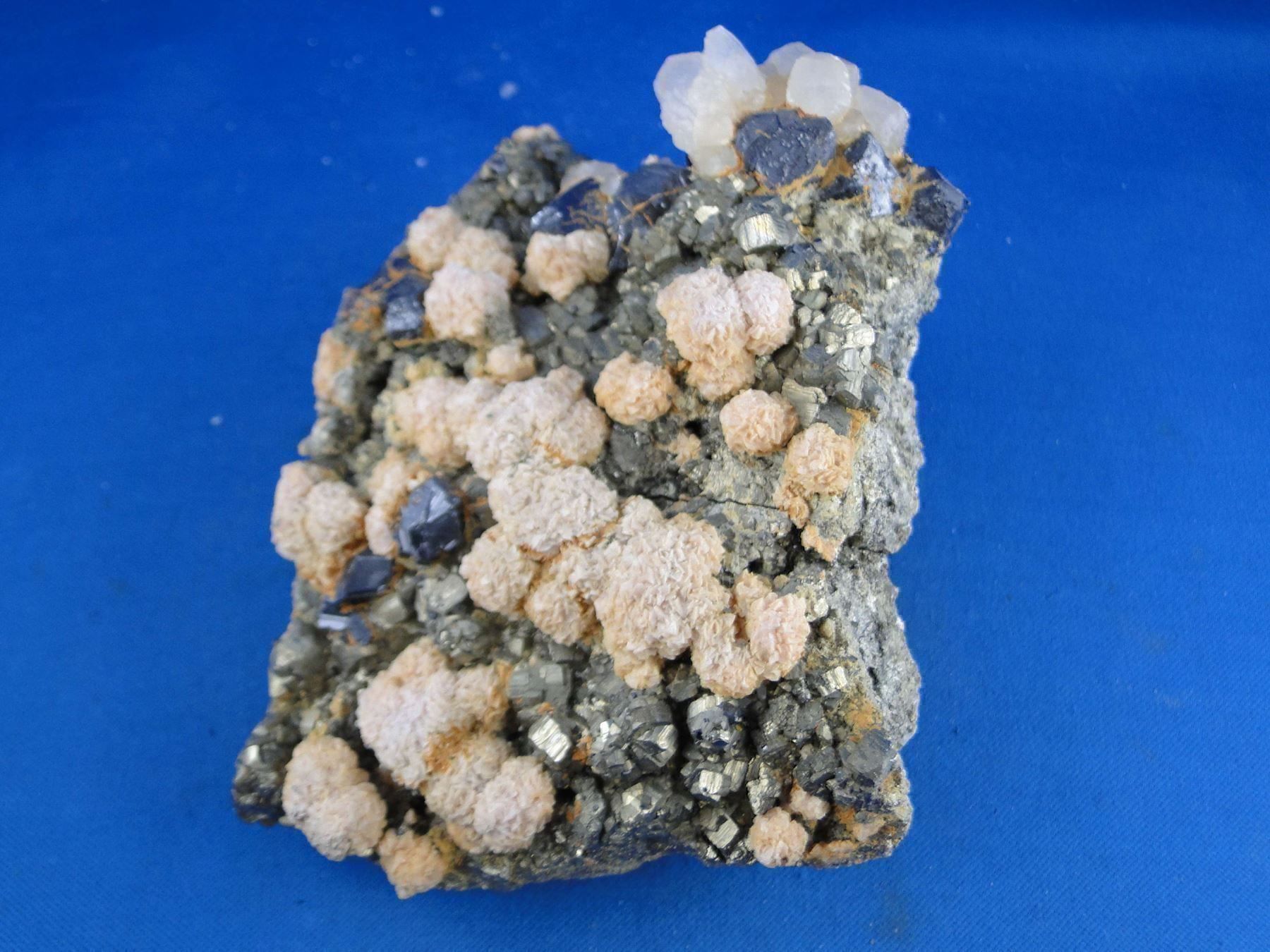 Minerali & Pietre curative: Rhodochrosit mit Sphalerit und Pyrit – Usato da Schinznach Bad venduto da Demerald 6