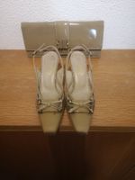 Damenschuh mit Handtasche
