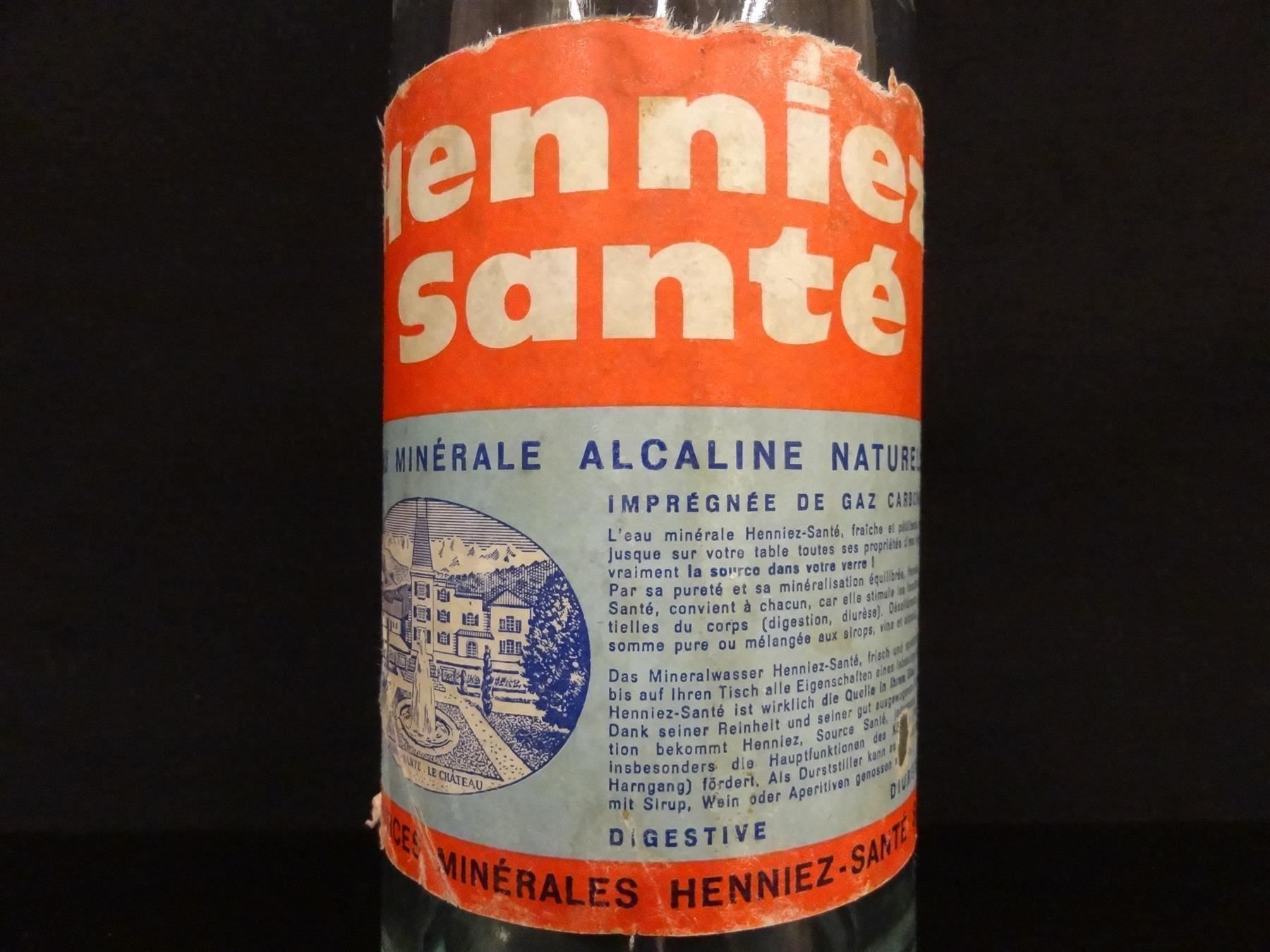 Bicchieri, Caraffe & Bottiglie: alte Flasche HENNIEZ SANTÉ – Usato da Kerzers venduto da Flaschenposten 1