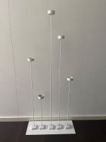 Magnetic floor candle holder