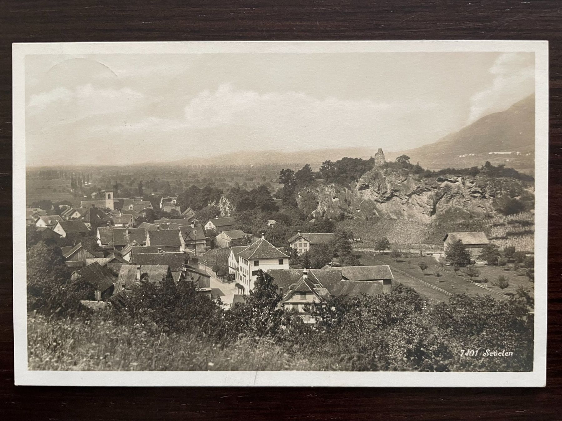 Ansichtskarten: SEVELEN Ortsansicht mit Kirche, Feldpost – Gebraucht aus Wald ZH von TLILEF