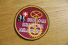 Motm Schule 84, Badge