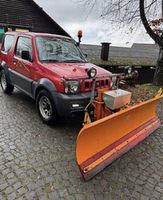 Suzuki Jimny mit Schneepflug Winterdienst