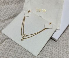 Collier Dior double chaîne perles et CD plaqué or