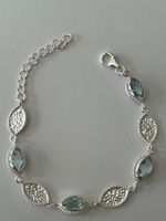 Armband aus Sterling Silber, facettierter blauer Topas