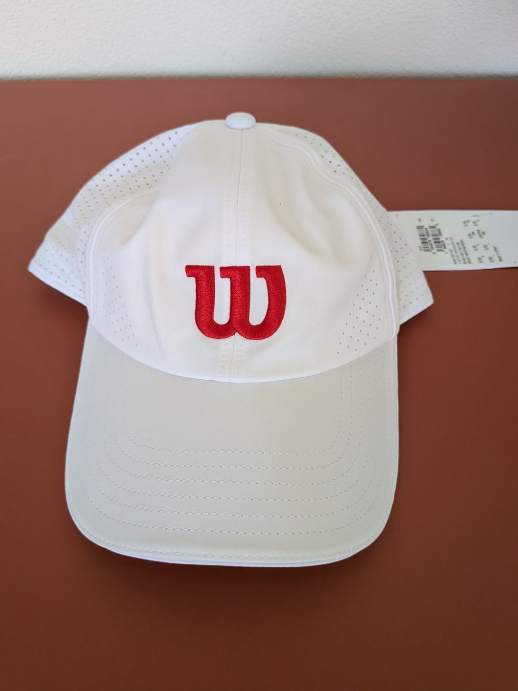 Copricapi, berretti & cappellini: NEU Perforated Cap Wilson - Originalpreis 49.90 – Nuovo e nell'imballaggio originale da Zürich venduto da sve_kk5x
