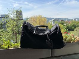 A stylish black suitcase