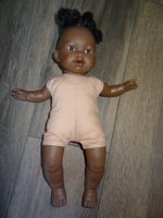 Poupée bébé noire cheveux tressés très bon état