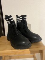 Bottes d'hiver noires, taille 38 - parfaites pour la saison!