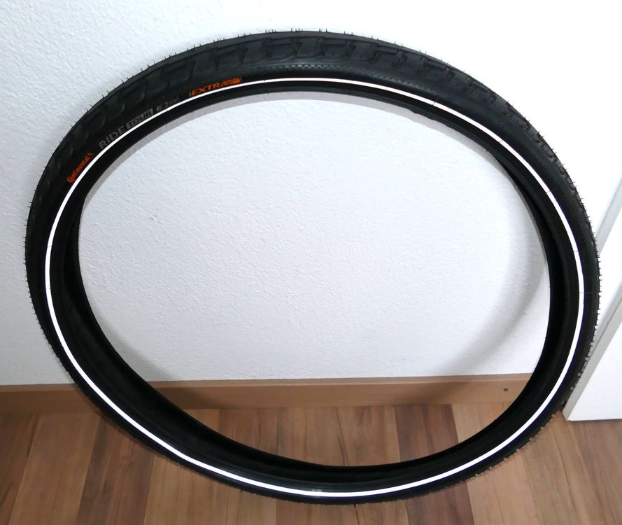 Pneu Continental Ride Tour 27 X 1 1/4 - Flanc Blanc - VTT/Vélo Route - Neuf