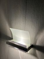 Vier Designerwandlampen