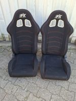 2 sièges baquets rabattables noirs