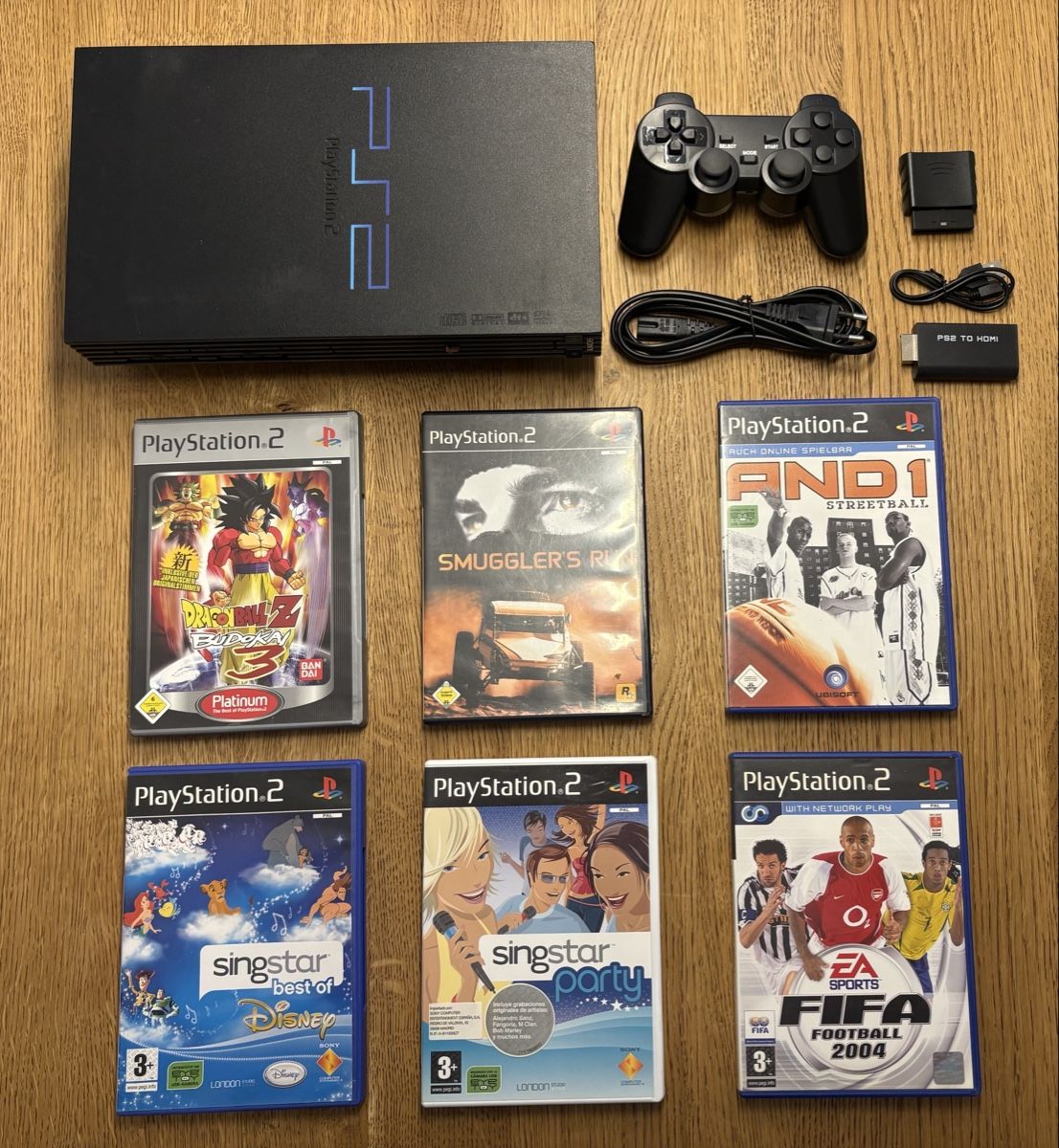 Sony Console: PlayStation 2 Konsole inkl. Controller, HDMI-Adapter & Spiel – Usato da Niederrohrdorf venduto da Olykesh