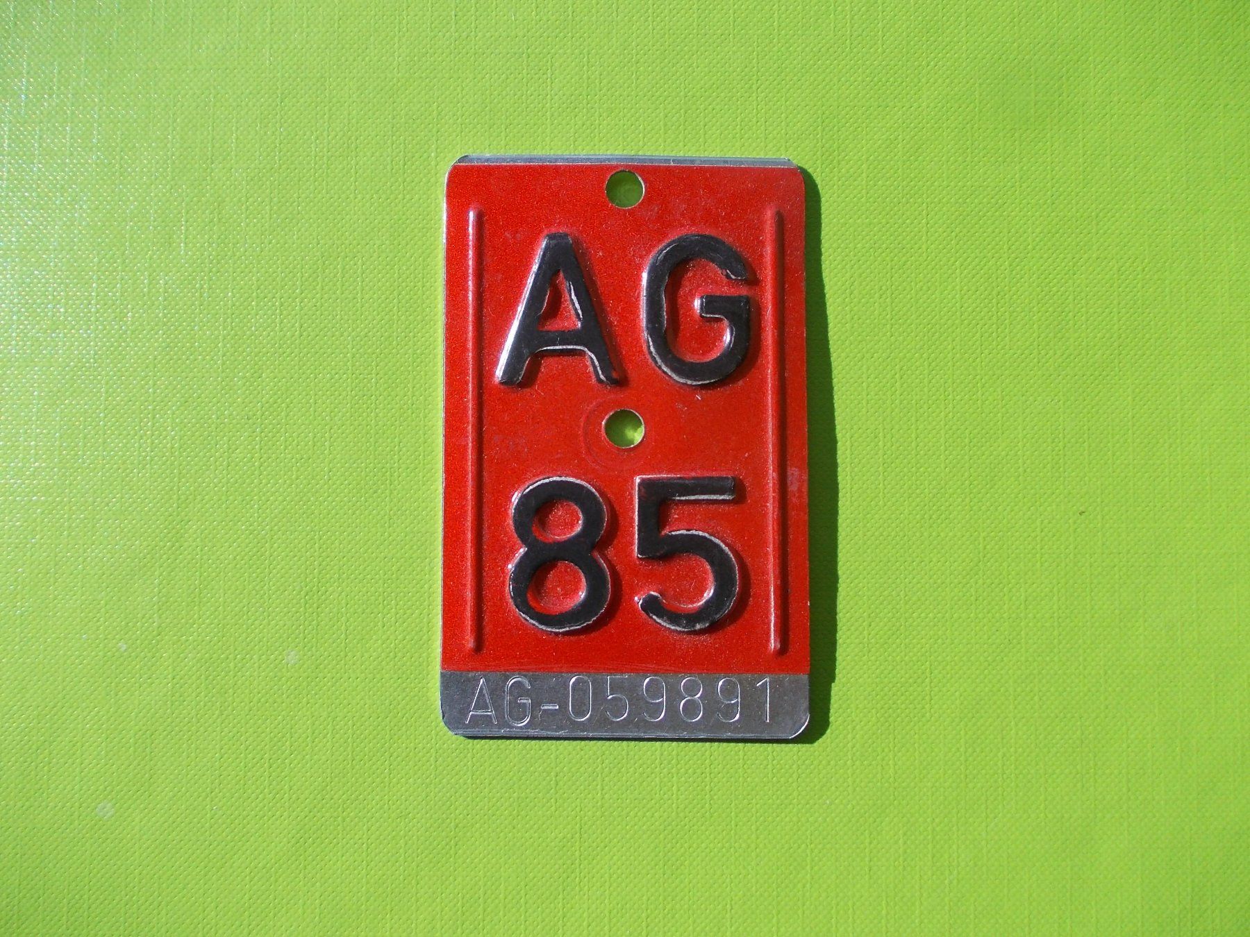 Insegne: Velonummer / Fahrradnummer AG 85 – Usato da Gsteigwiler venduto da HORMIGA21