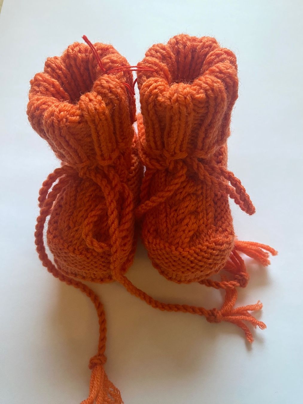 Lana: Finkli / Babyfinkli handgestrickt orange – Nuovo e nell'imballaggio originale da Pfäffikon ZH venduto da Suribu