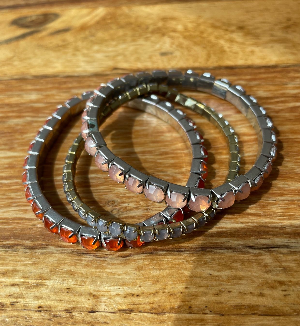 Bracciali & Braccialetti: 3 Stretcharmbänder – orange, lachs, olive – Usato da Grenchen venduto da M_ina 2