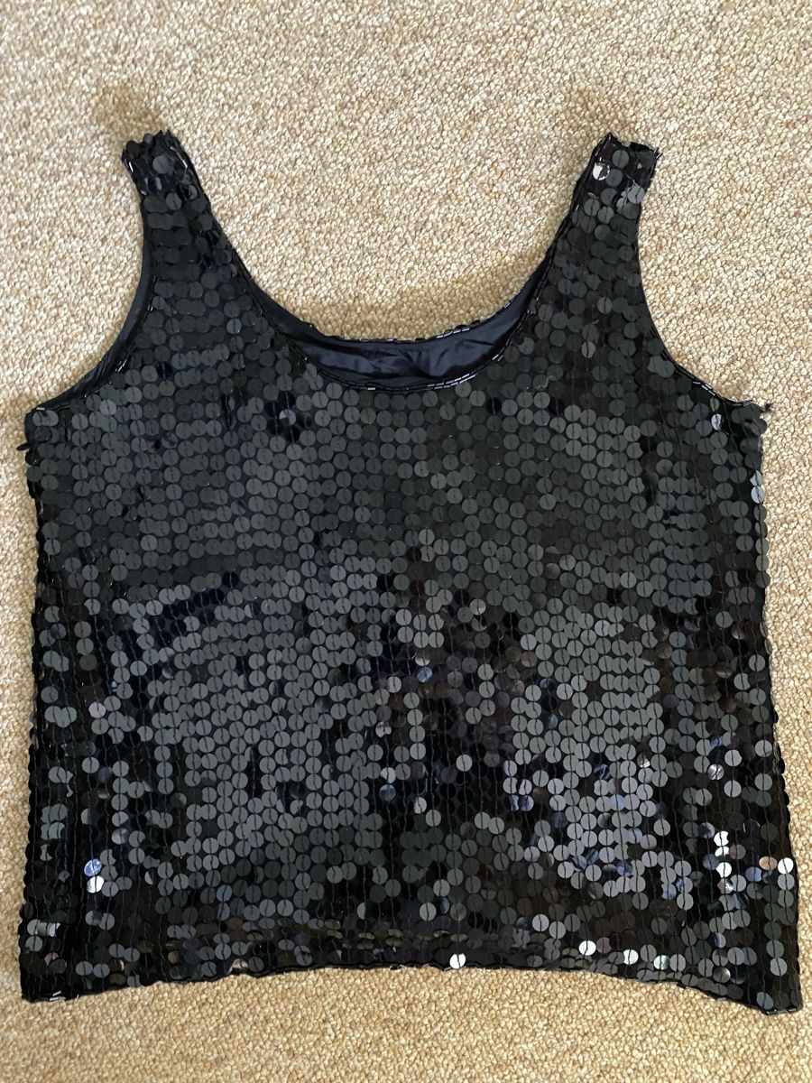 Top: Top noir paillettes taille 36 – Usato da Küssnacht am Rigi venduto da CALIFRASQUI