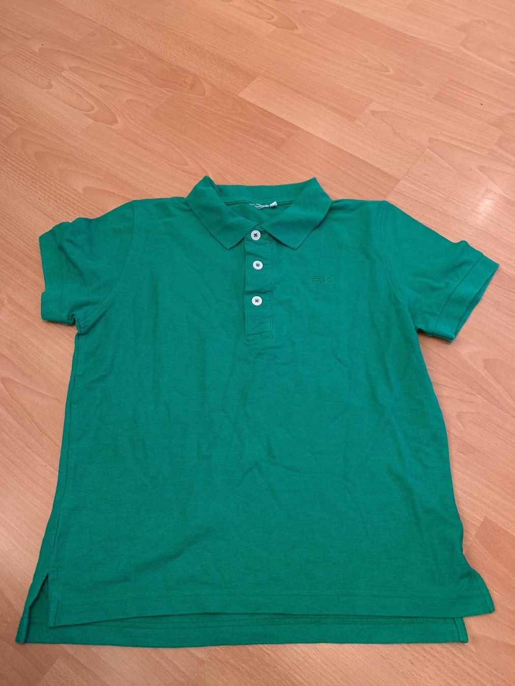 Fila Magliette Polo: Joli polo vert Fila taille S – Usato da MEYRIN venduto da Gwendo10