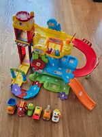 Tut Tut Flitzer-Garage mit mehreren Fahrzeugen
