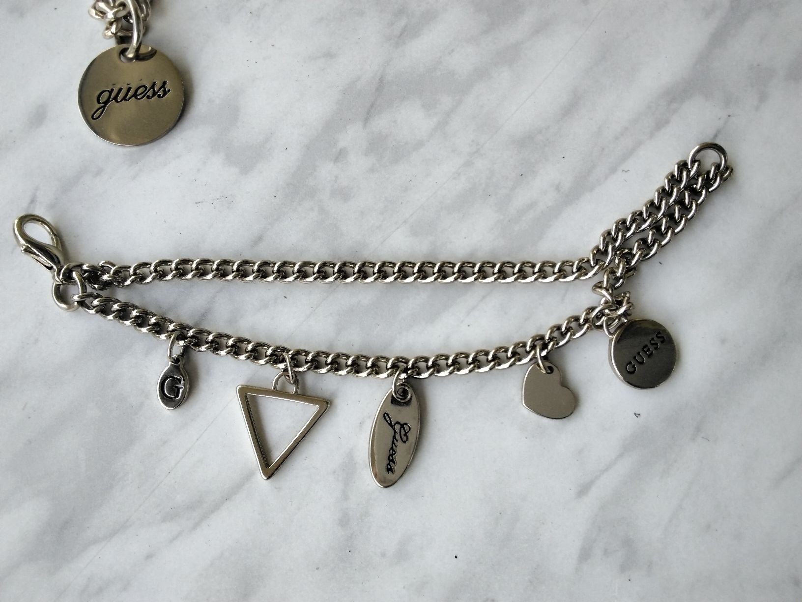 Guess Bracciali & Braccialetti: GUESS ARM / TASCHEN KETTELI + CHIP – Usato da Biel/Bienne venduto da dasi3