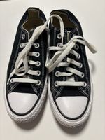 Schwarze Converse All Stars