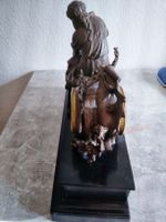 Antike Uhr mit Figur und Aufzugschlüssel, Bronze