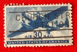 Briefmarken aus USA in den Flugpost gestempelt