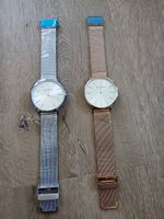 Zwei Armbanduhren rose gold/silber
