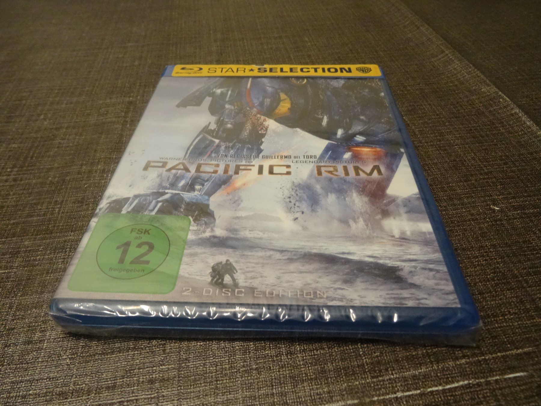 Tutti i DVDs: Pacific Rim BLU-RAY – Nuovo e nell'imballaggio originale da Olten venduto da Disc-Verkauf