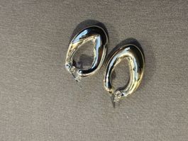 Superbes boucles d'oreilles argentées style moderne 