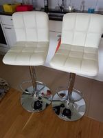 2 Tabourets de bar pivotants en simili cuir blanc