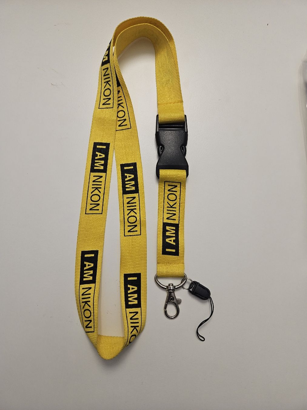 Nikon Portachiavi: Original Nikon Schlüsselband, gelb – Usato da Zürich venduto da zweistein03