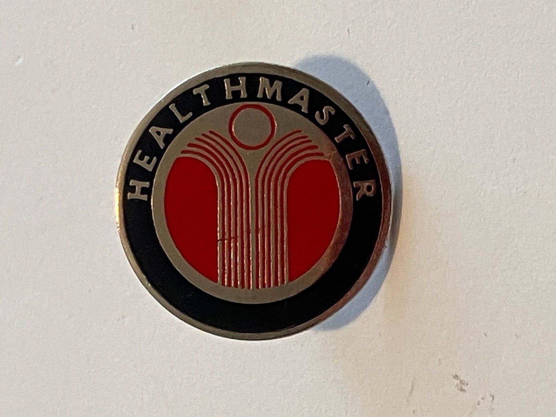 Placchette & Badge: 1 Pin Healthmaster – Usato da Basel venduto da djwwpp